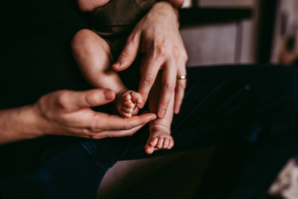 Man holds child